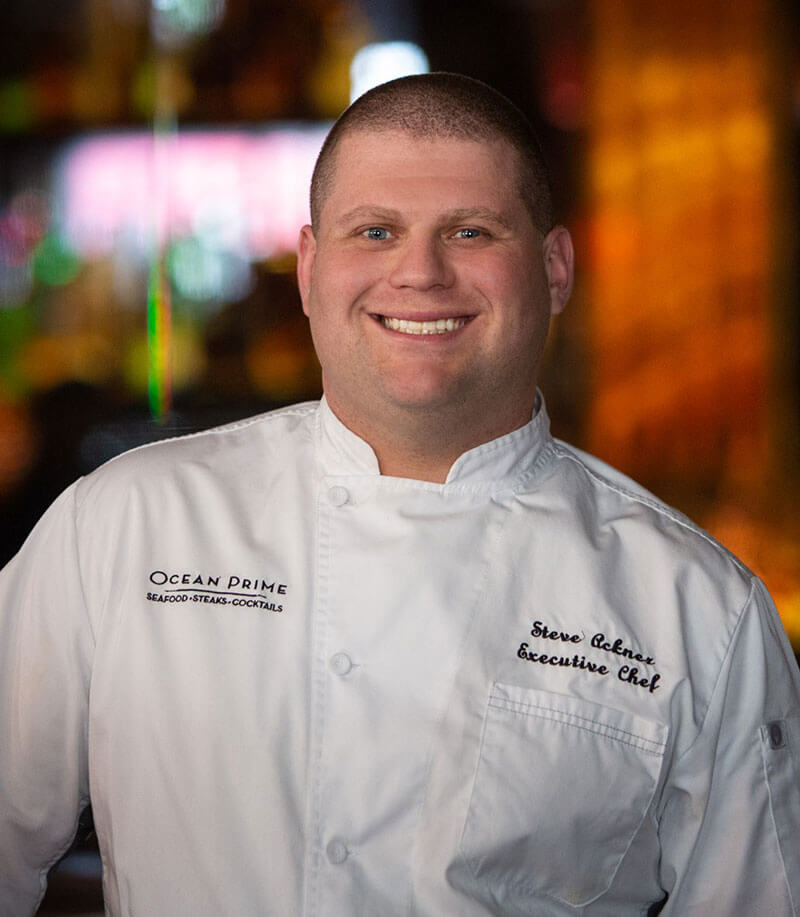 photo of smiling Steve Ackner, the executive chef at Ocean Prime in Boston